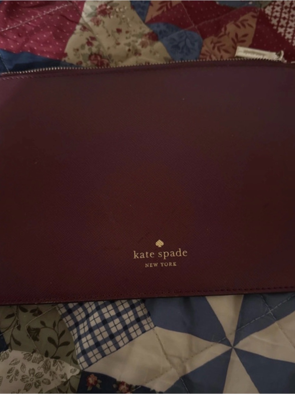 kate spade Burgundy Saffiano Zip Wristlet with Gold Logo